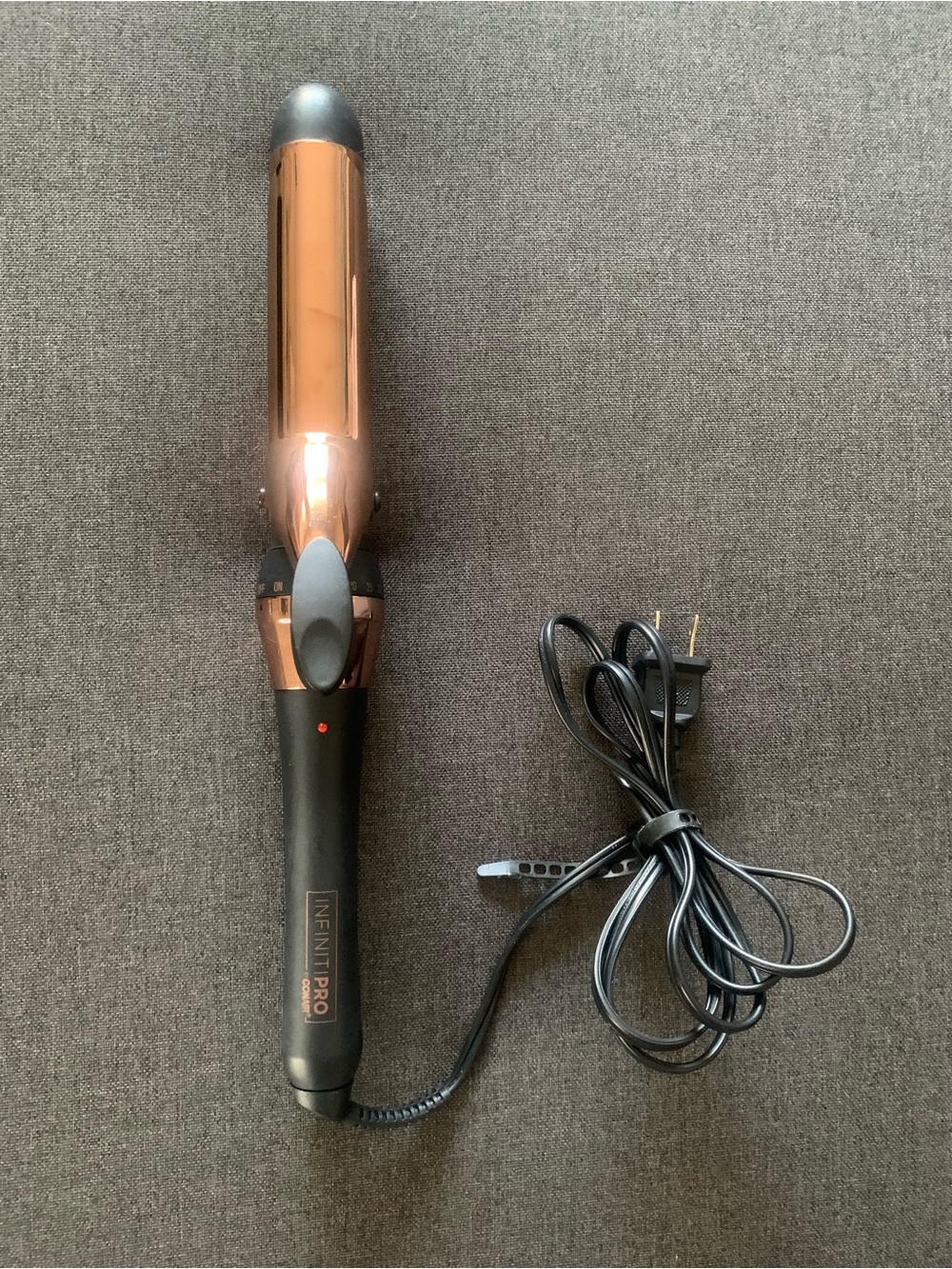 The InfinitiProInfinitiPro By Conair Rose Gold Titanium Curling Iron 1 1/4 Inch